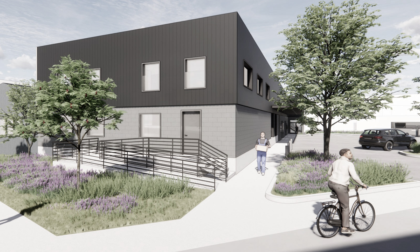Architectural rendering of a modern two-story building with black siding, concrete block, and a landscaped ramp.