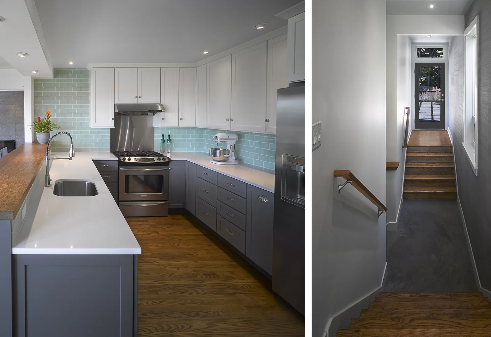 Modern kitchen with blue tile backsplash and grey cabinets, alongside a view of a narrow wooden staircase.