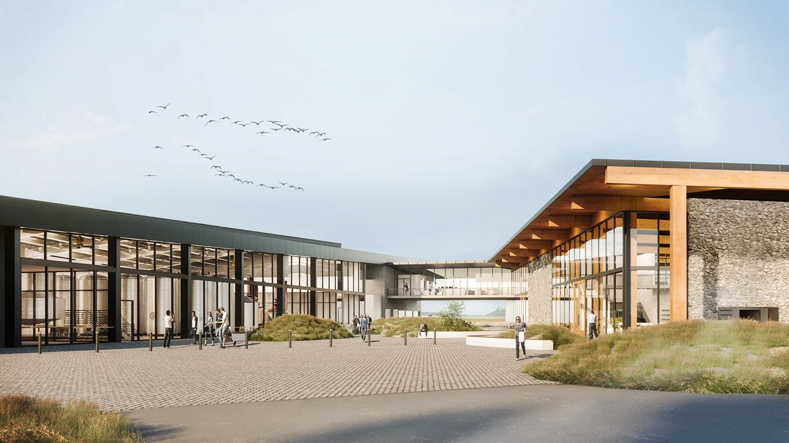 Architectural rendering of a modern distillery complex with glass facades, timber framing, and a paved courtyard.
