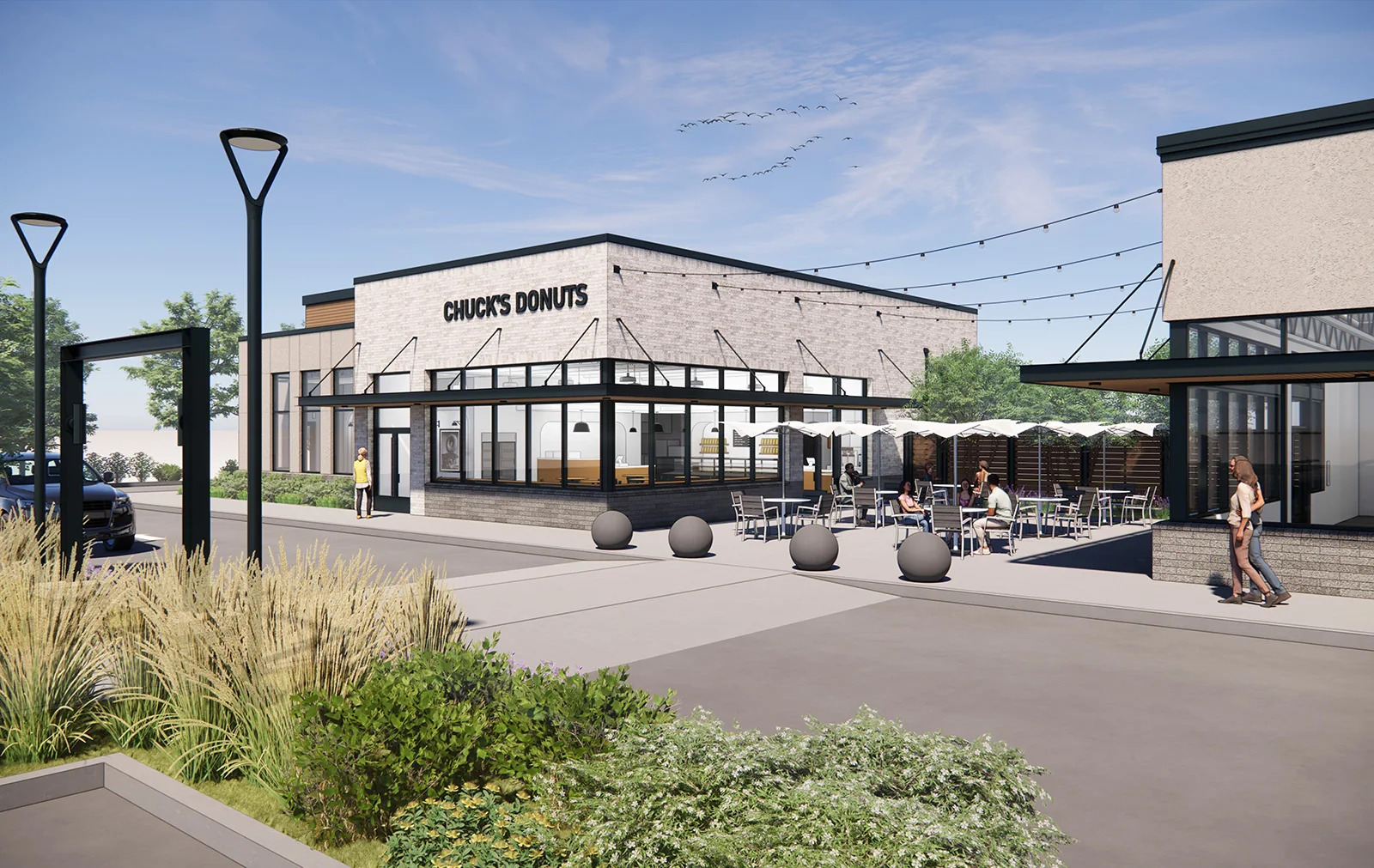 Architectural rendering of Chuck's Donuts in a modern commercial plaza with outdoor patio seating.